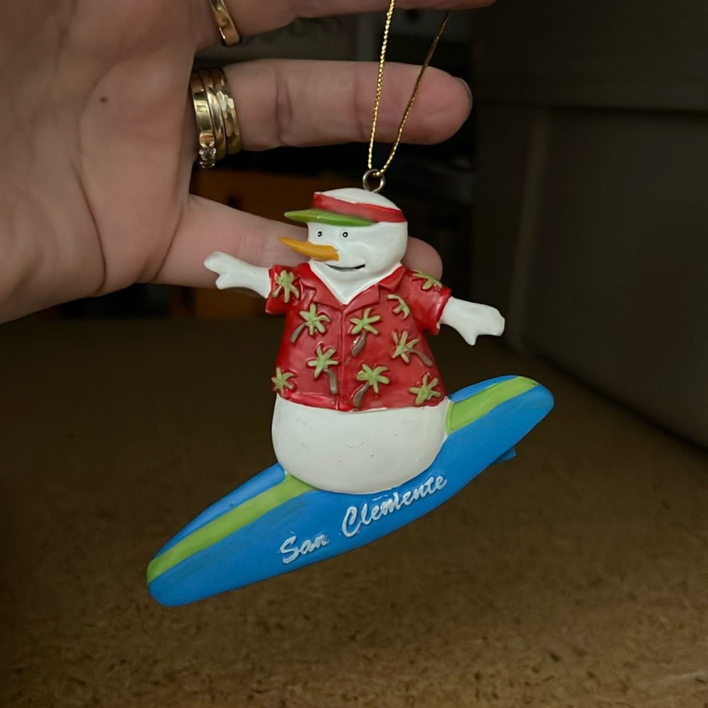 Snowman on a surfboard Christmas ornament San Clemente Vintage Kurt S Adler art